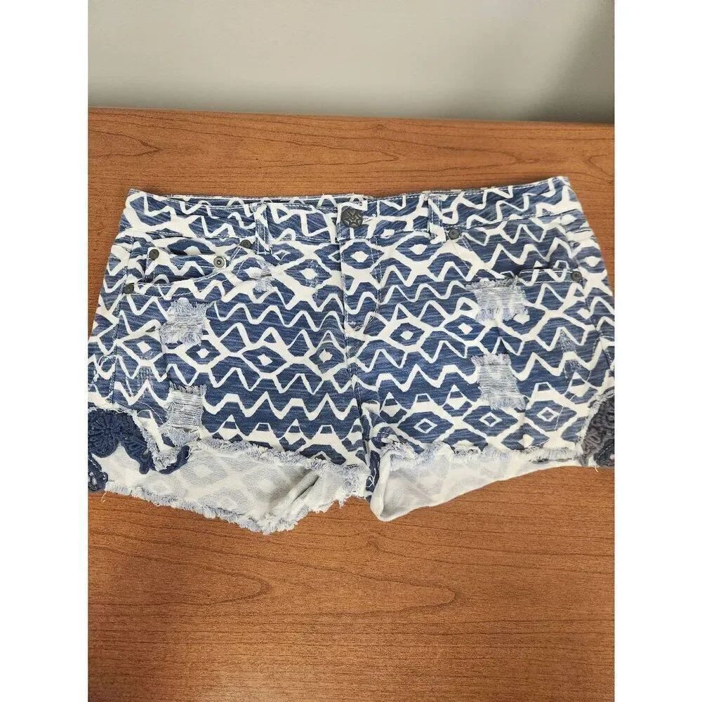 Rue 21 Cutoff Denim Shorts. Blue and white Print, Lace Insets, Distressed. Sz 11